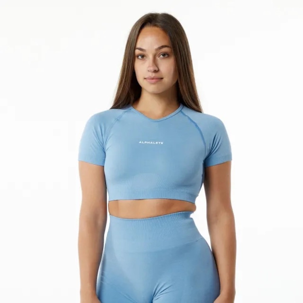 Alphalete Amplify Washed Denim Crop Top.
